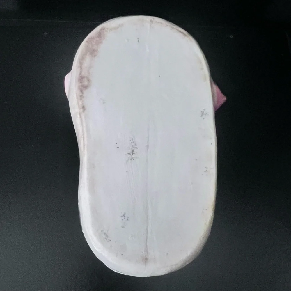 Vintage ceramic baby bootie vase